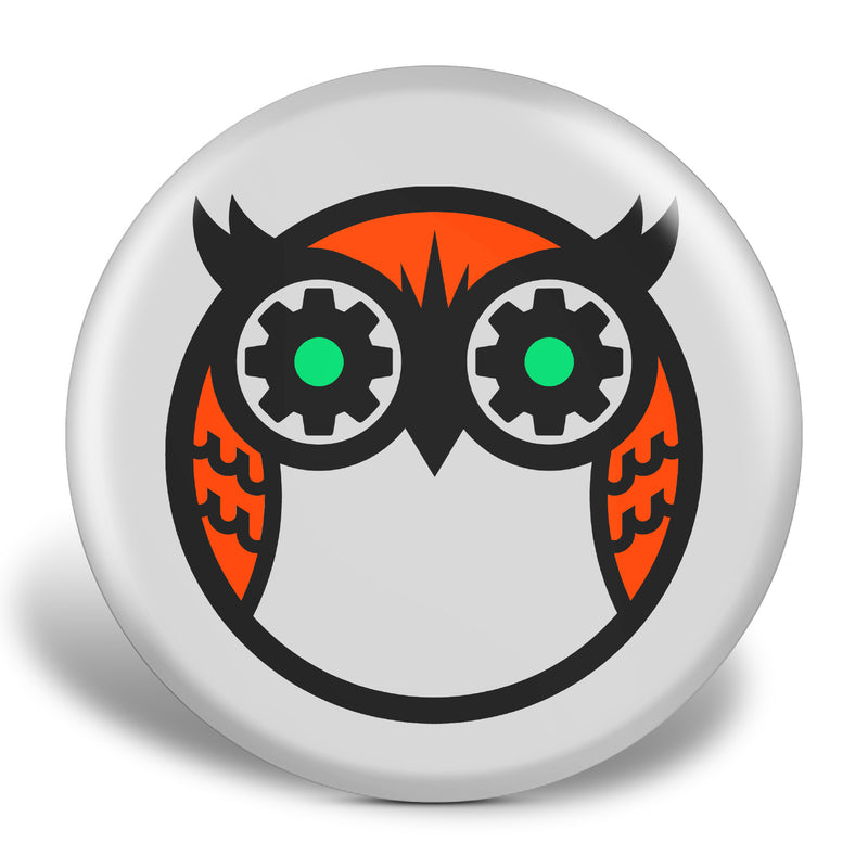 Try Discs owl logo in black, orange, and green on a white disc golf disc
